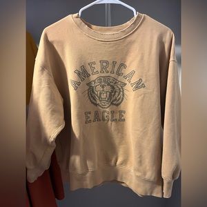 American Eagle yellow crew neck.